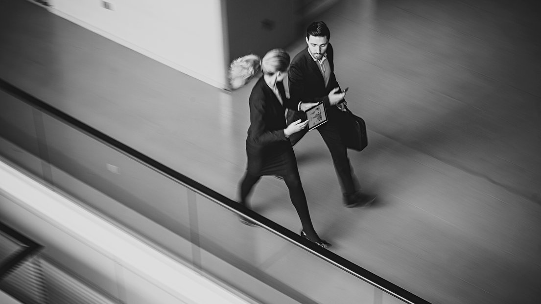 Business couple walking