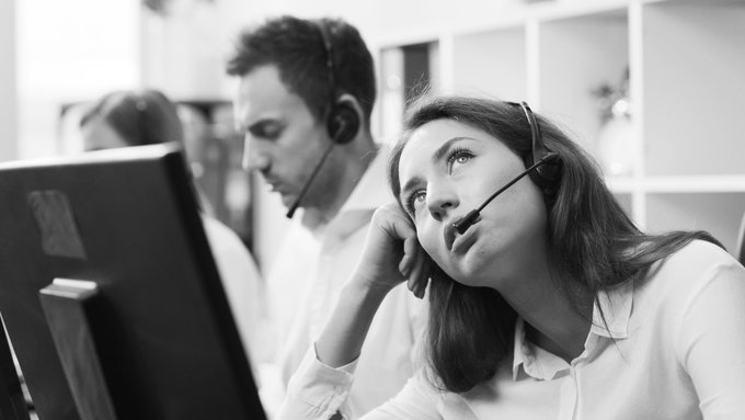 Woman bored taking calls